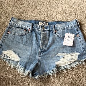Free people never worn Jean ripped shorts